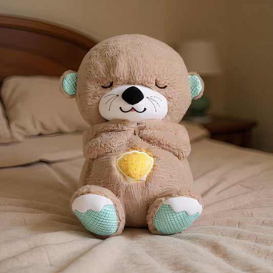 Peluche loutre respirante avec berceuse apaisante